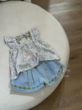 Mini Kelly blue floral top styled with daisy denim shorts
